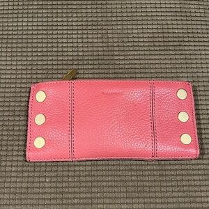 Hammitt 110 North wallet in salmon/pink/rouge.
